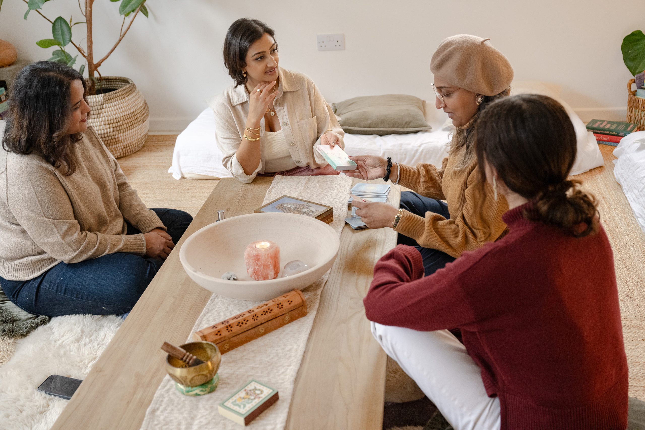 Women gathered in a wellbeing circle during a guided reflection session