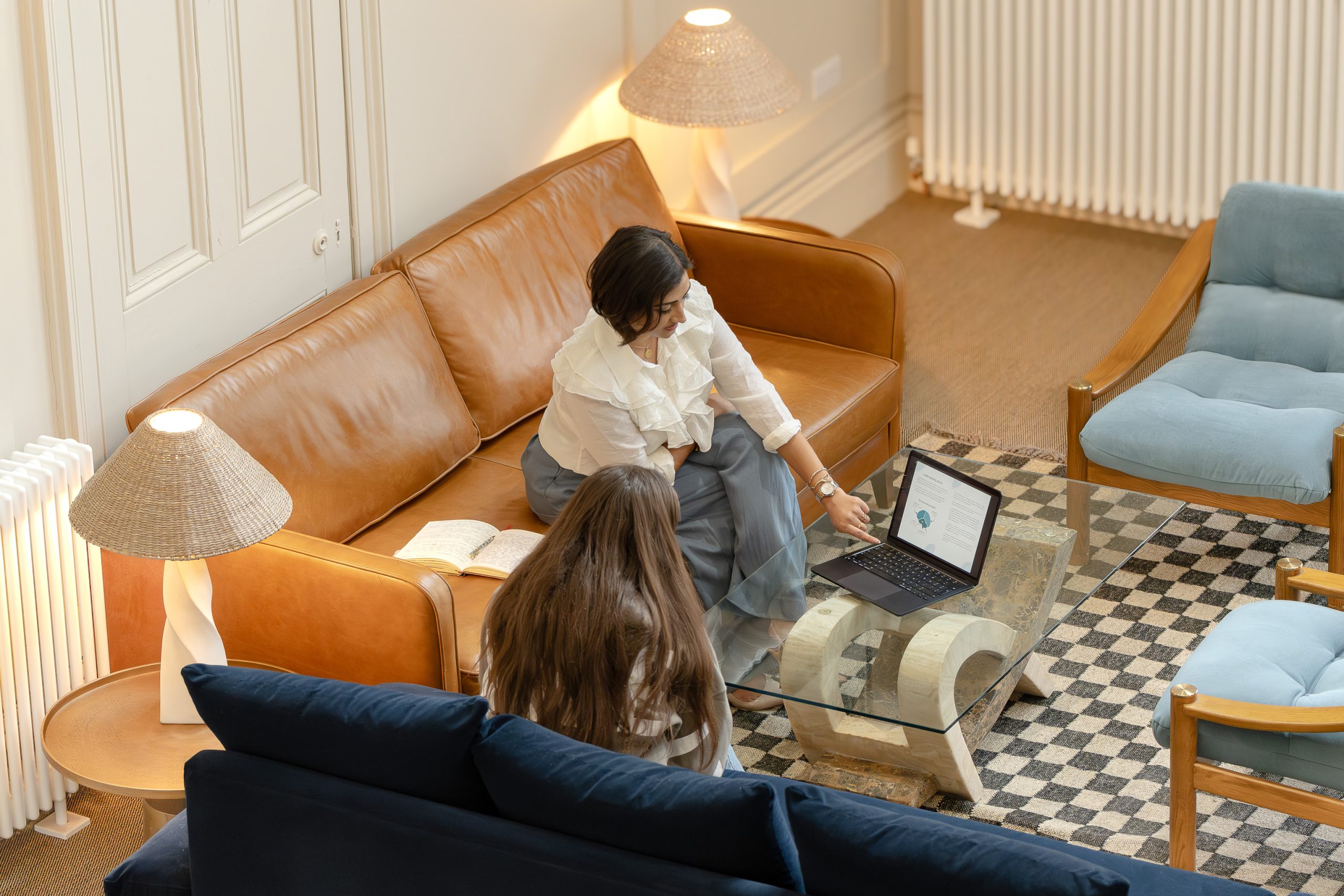 Therapist supporting a client during a wellness coaching session