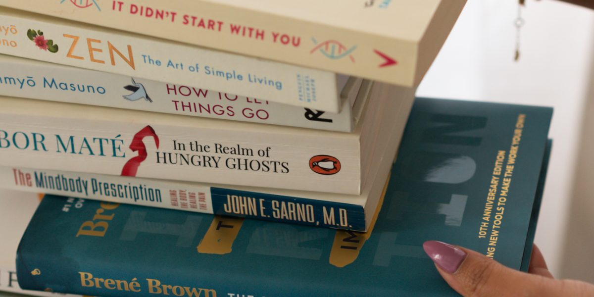 Stack of therapy and hypnotherapy books